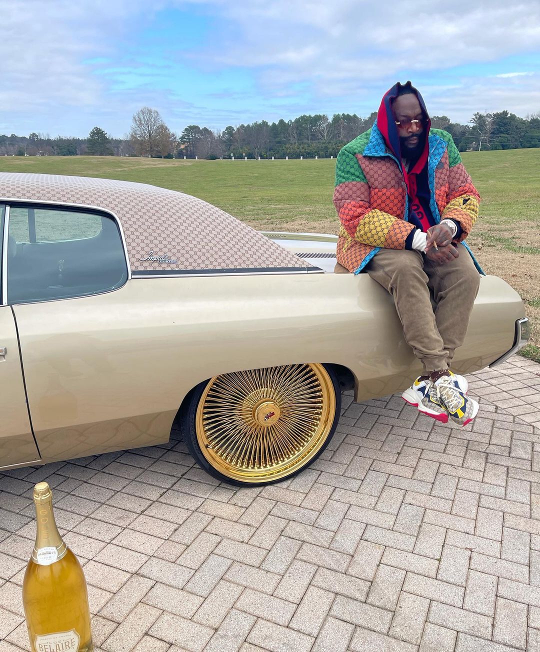 Rick Ross Chills on the Trunk of his 1971 Chevrolet Impala That's Been  Guccified - autoevolution