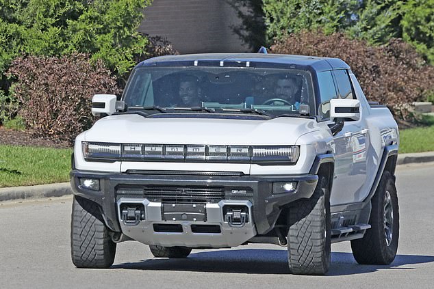 Travis (R) and a friend were seen heading to Firehouse Subs to pick up sandwiches on Oct. 9