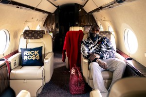 On board his new G550, Ross brings his own Goyard bag. The blankets were sewn for the rapper using Vuitton fabric.