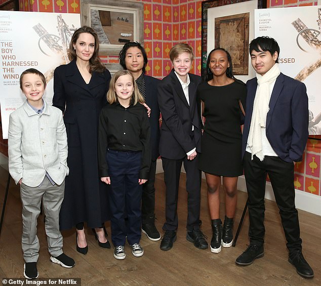 Angelina pictured with her six children in New York City in 2019. Her daughter Zahara (second to right) seemingly dropped 'Pitt' from her last name at her AKA sorority initiation at Spelman College last year